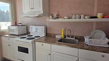 Fridge, microwave, coffee/tea maker, electric kettle