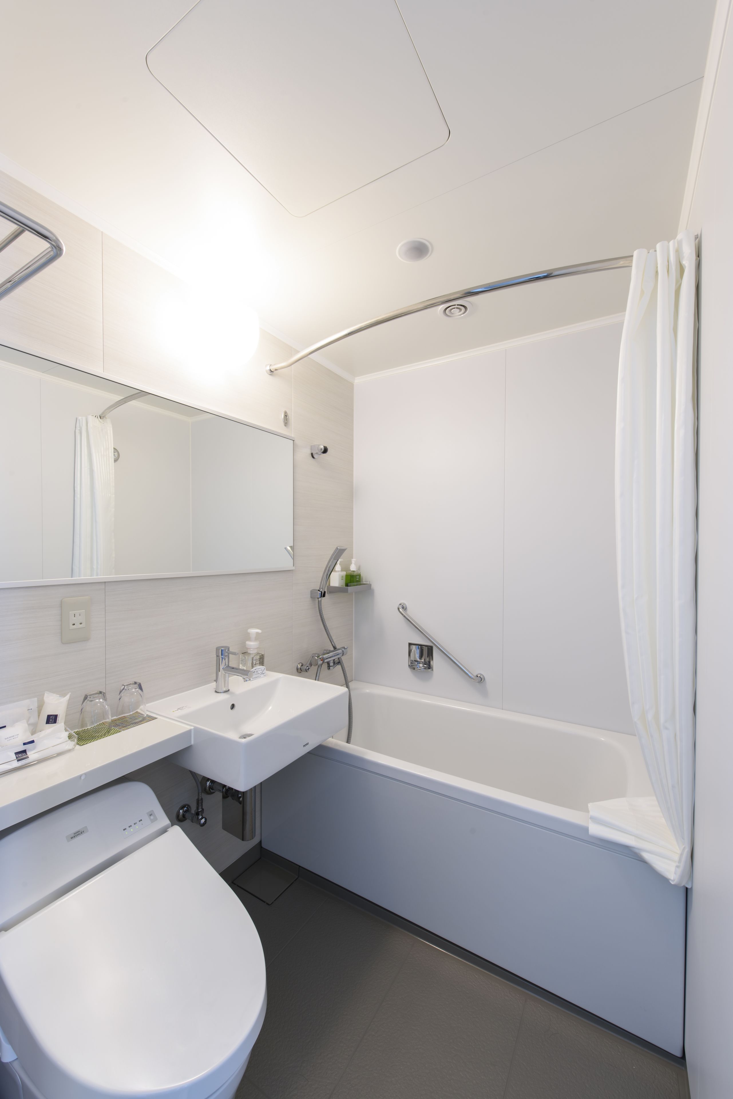 shower, eco-friendly toiletries, hair dryer, slippers