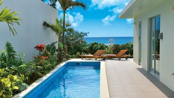 Outdoor pool, a heated pool, pool loungers