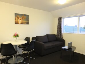 Luxury Apartment, 2 Bedrooms | Living area | Flat-screen TV - 101 Stars Motel (Christchurch)