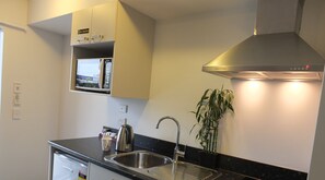 Superior Apartment, 1 Bedroom | Private kitchenette | Fridge, microwave, stovetop, electric kettle