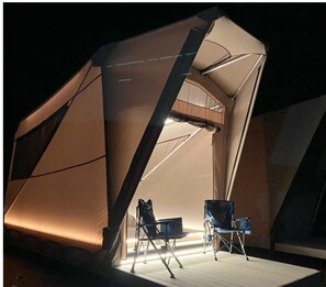 A tent with a wooden deck, two chairs, and a table. - Indian Flat RV Park - Tent Cabins & Cottages (El Portal)