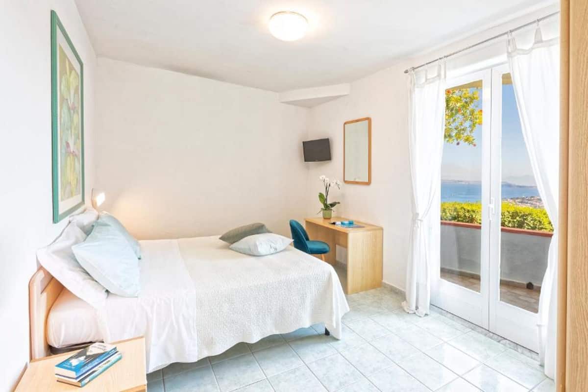 Standard Room, Balcony, Sea View | In-room safe, desk, free WiFi, bed sheets