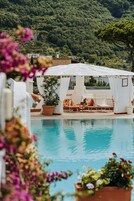 Indoor pool, seasonal outdoor pool, pool umbrellas, sun loungers