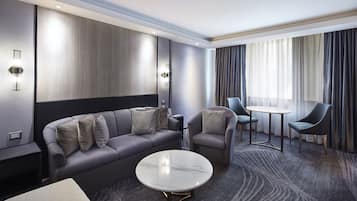 Suite junior | Área de sala de estar | Televisión