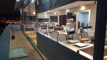 Breakfast, lunch, dinner served; international cuisine