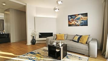 Apartamento superior, 1 quarto (Sea Side) | 1 quarto, roupas de cama premium, cofres nos quartos