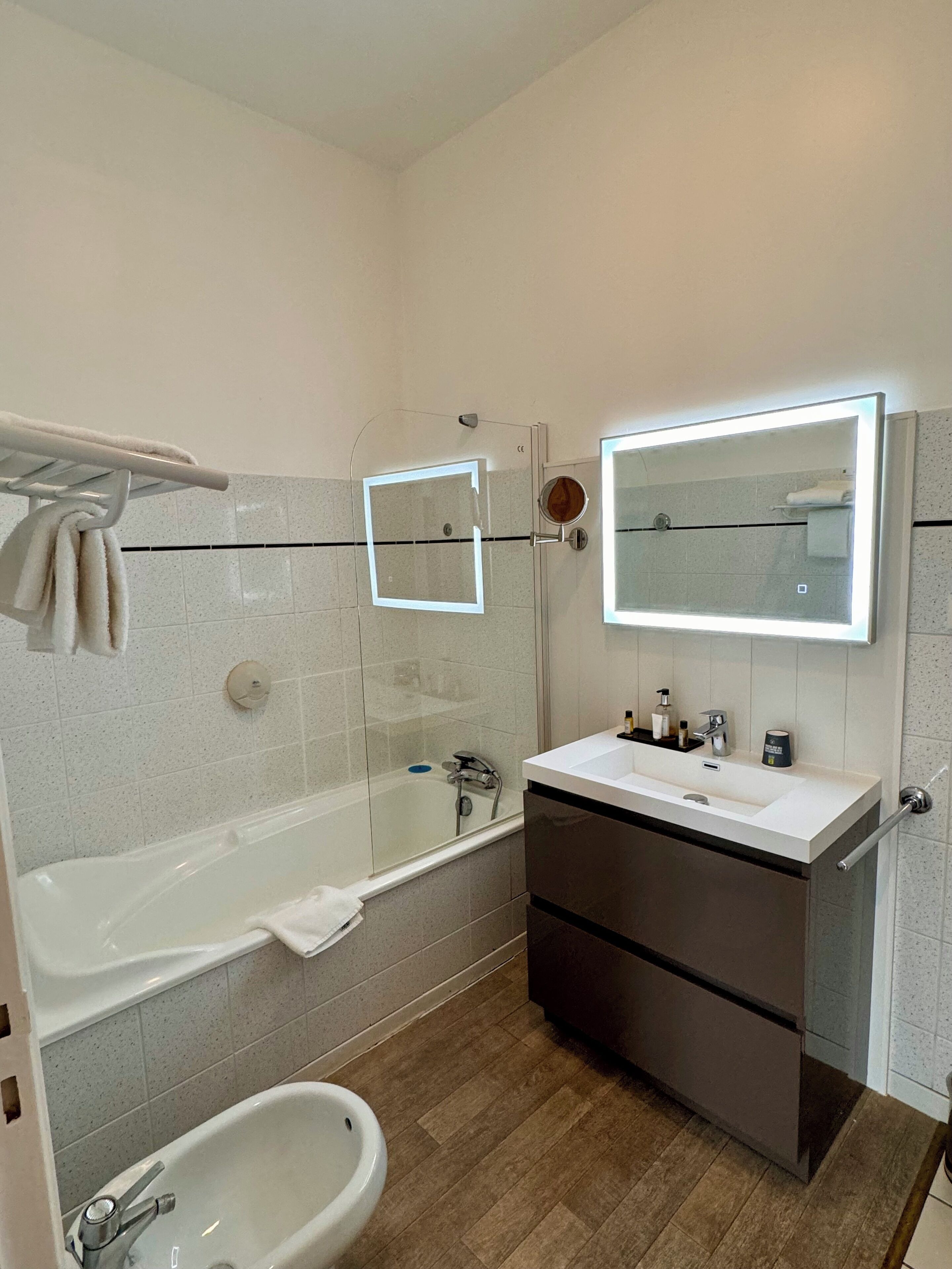 superior double room | bathroom | bathtub, free toiletries, hair dryer, towels