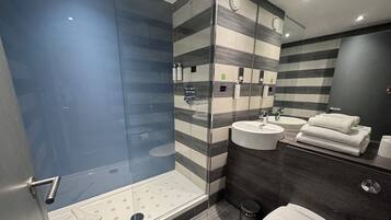 Shower, rainfall showerhead, eco-friendly toiletries, hair dryer