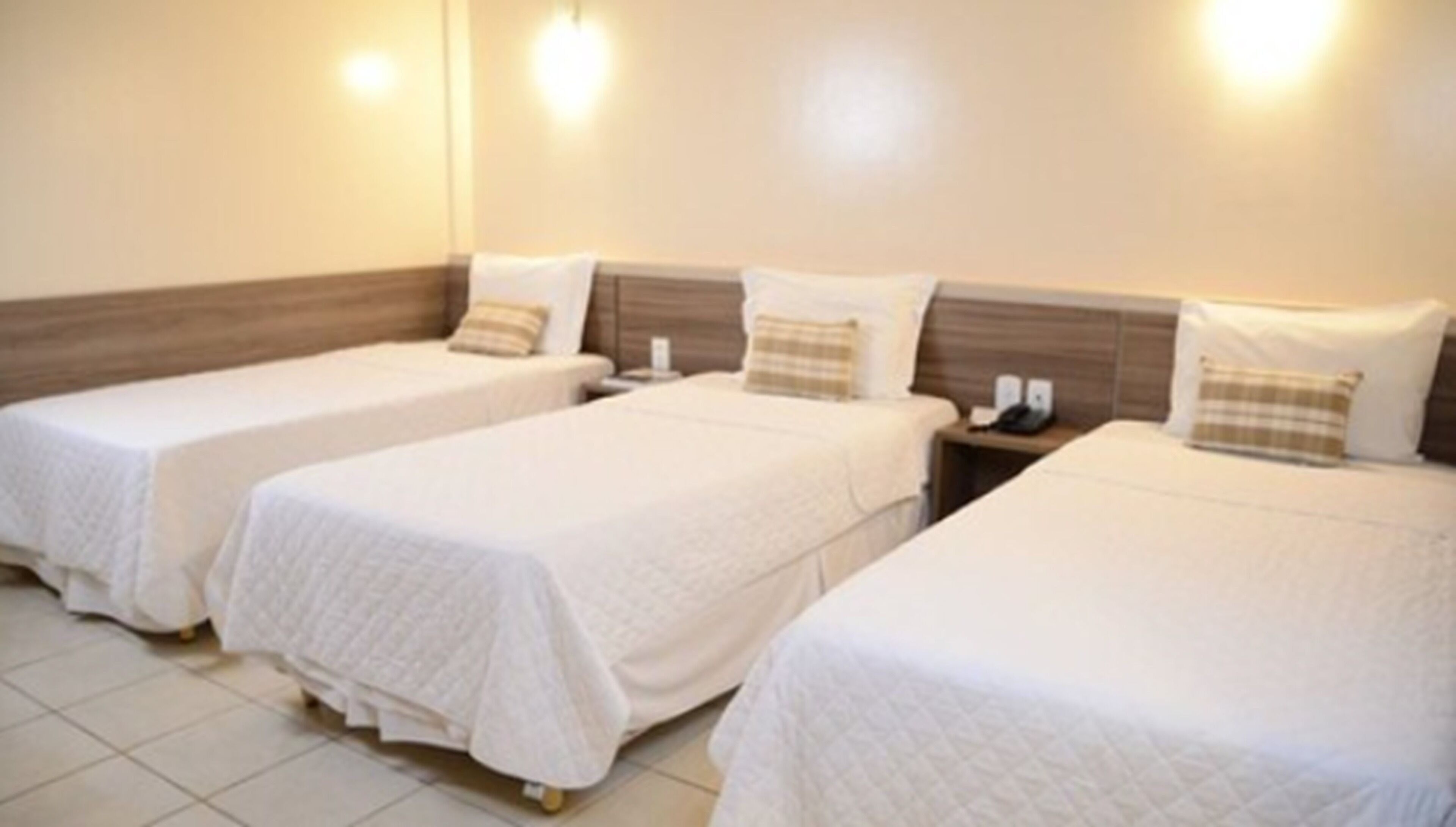 standard triple room | 1 bedroom, minibar, in-room safe, desk