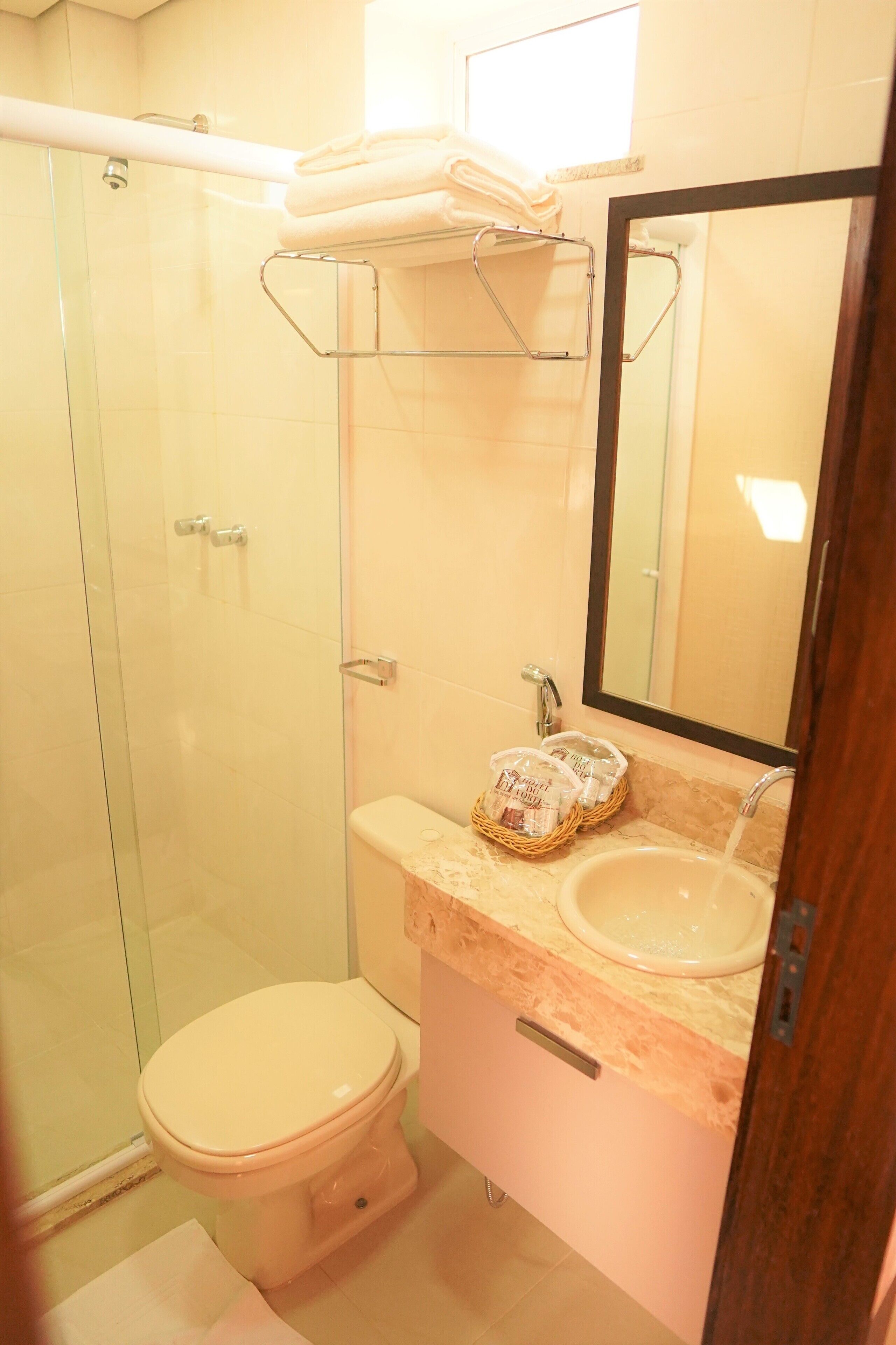 shower, free toiletries, hair dryer, towels