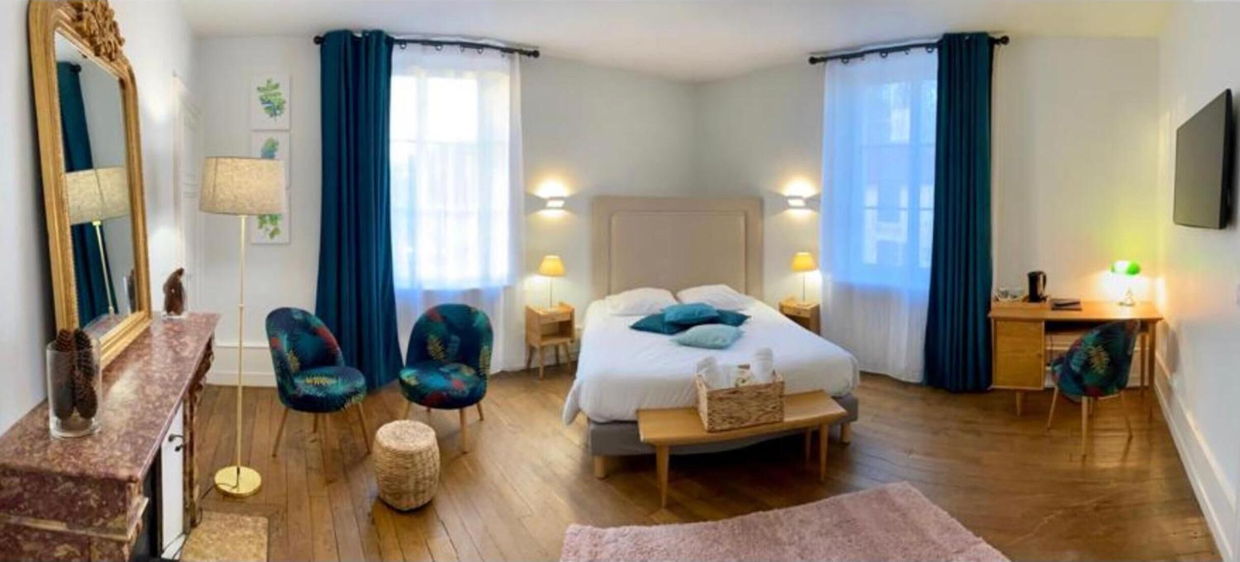 desk, laptop workspace, bed sheets