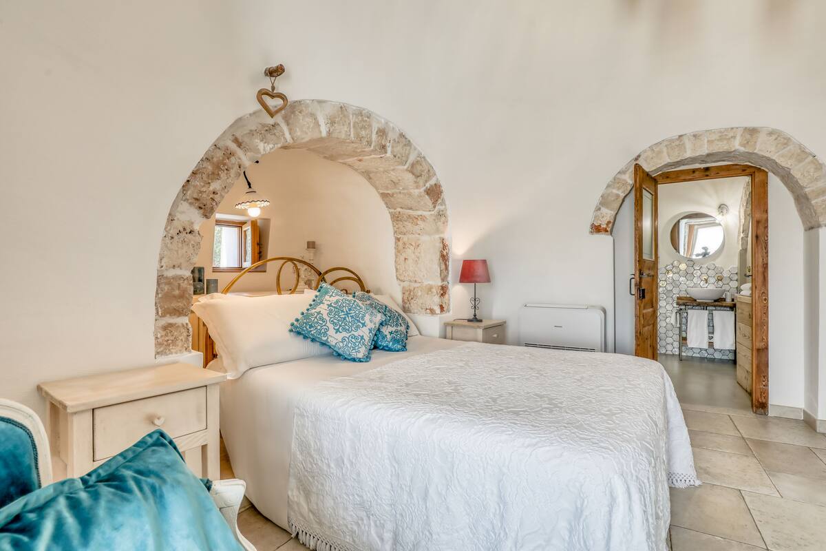 Chambre Deluxe (Trullo Magico) | 1 chambre, draps en coton égyptien, literie de qualité supérieure