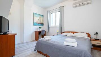 Apartment (Apartments Azzurro- Three Bedroom Apa) | Premium bedding, desk, free WiFi, bed sheets