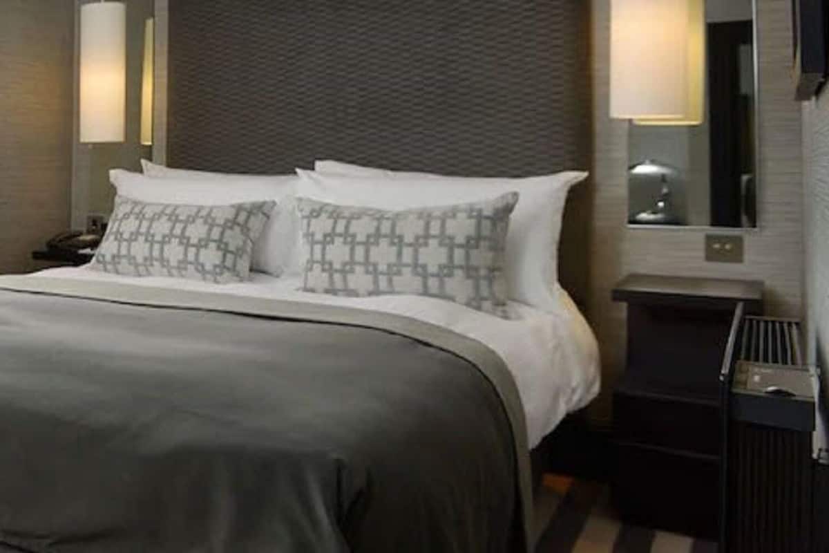 Egyptian cotton sheets, premium bedding, minibar, in-room safe