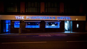 The Printworks Hotel with illuminated signage and a modern facade. - Printworks Hotel (Liverpool)