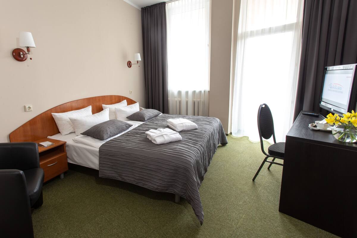 Desk, iron/ironing board, free cribs/infant beds, rollaway beds