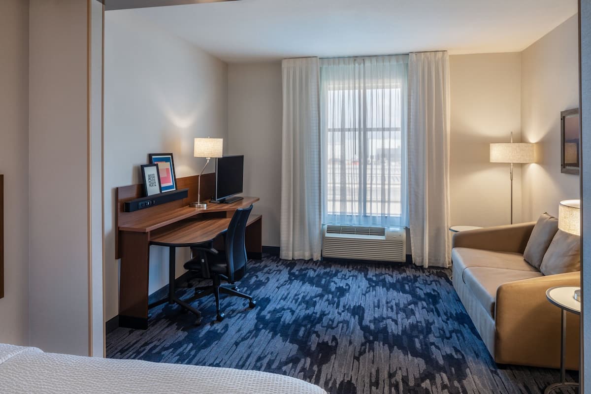 Premium bedding, down comforters, pillowtop beds, desk