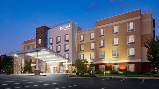 A Fairfield by Marriott hotel with a modern design, featuring a prominent entrance and multiple floors.