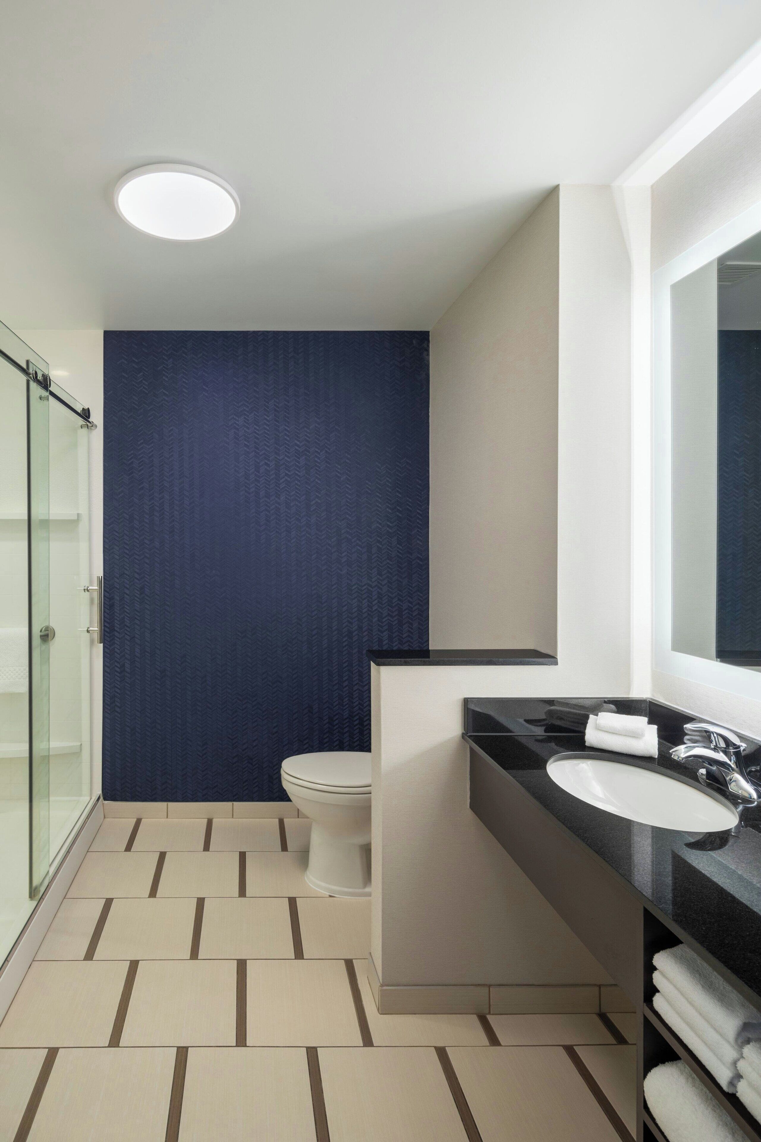 shower, hydromassage showerhead, free toiletries, hair dryer