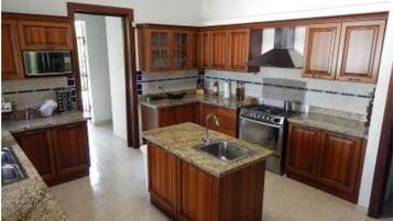 Luxury Villa, 4 Bedrooms | Private kitchen | Full-size fridge, microwave, oven, stovetop