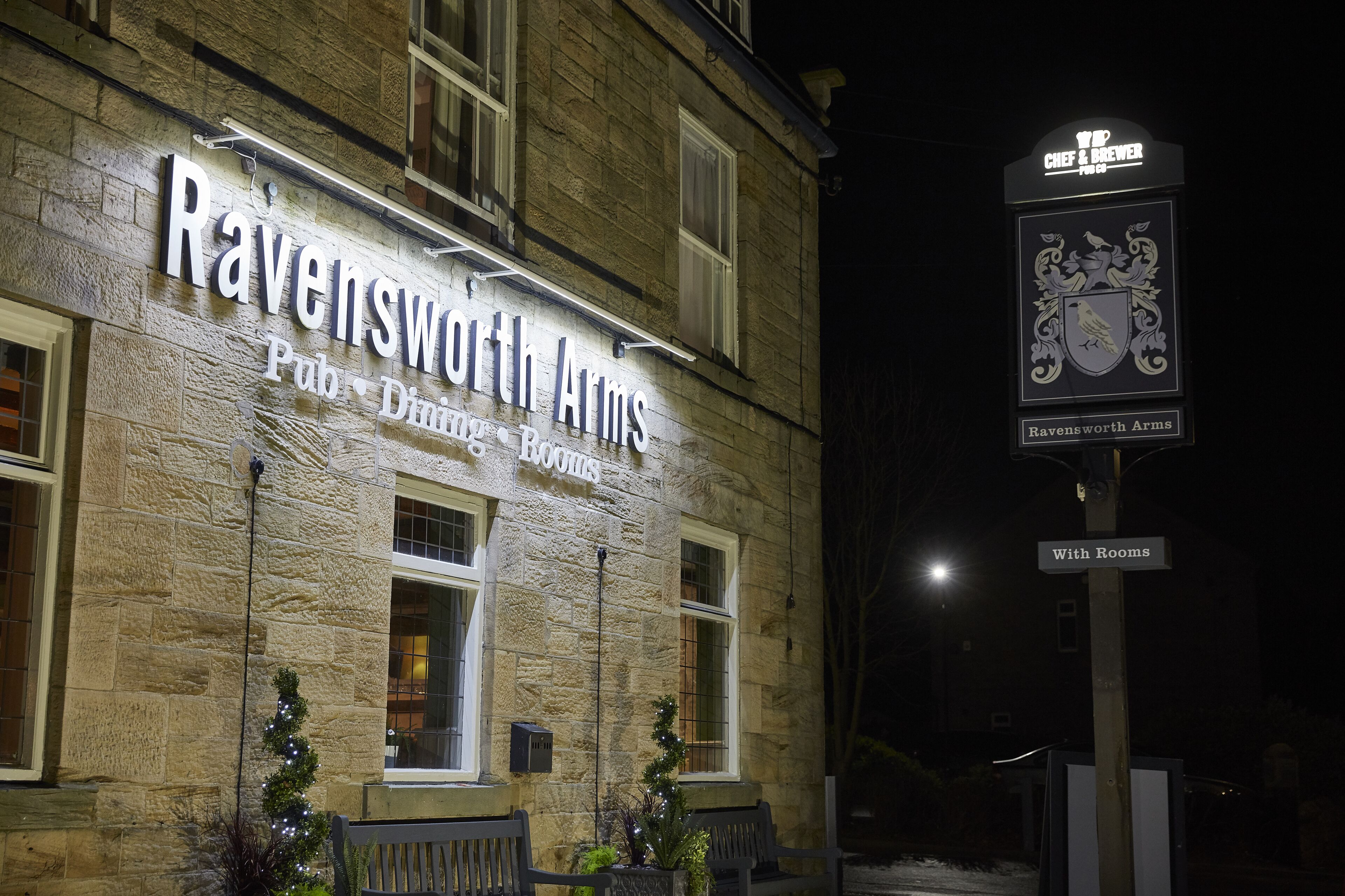 A building with a sign that reads "Ravensworth Arms Pub Dining Room."