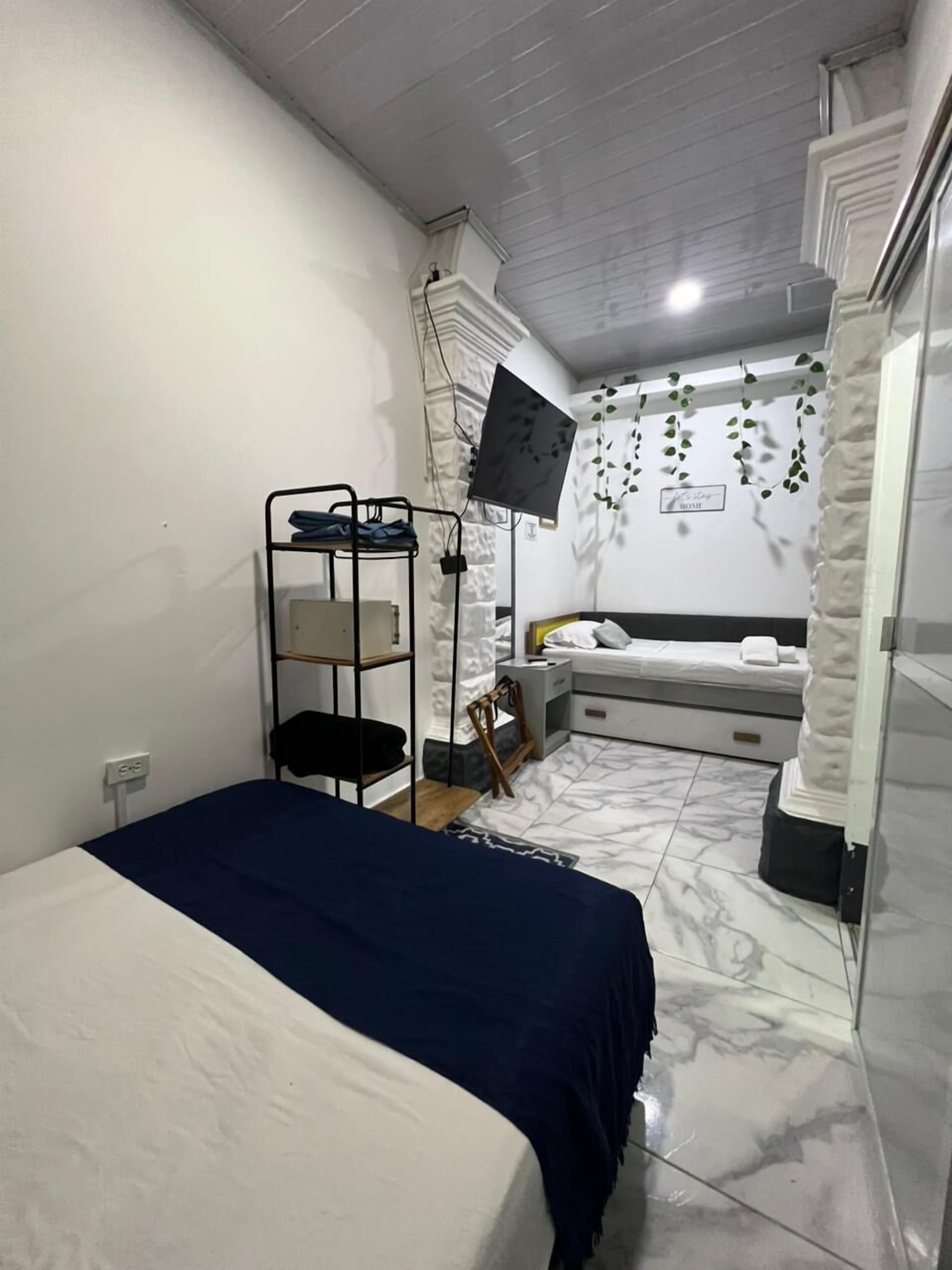 Familiekamer | Luxe beddengoed, een kluis op de kamer, verduisterende gordijnen