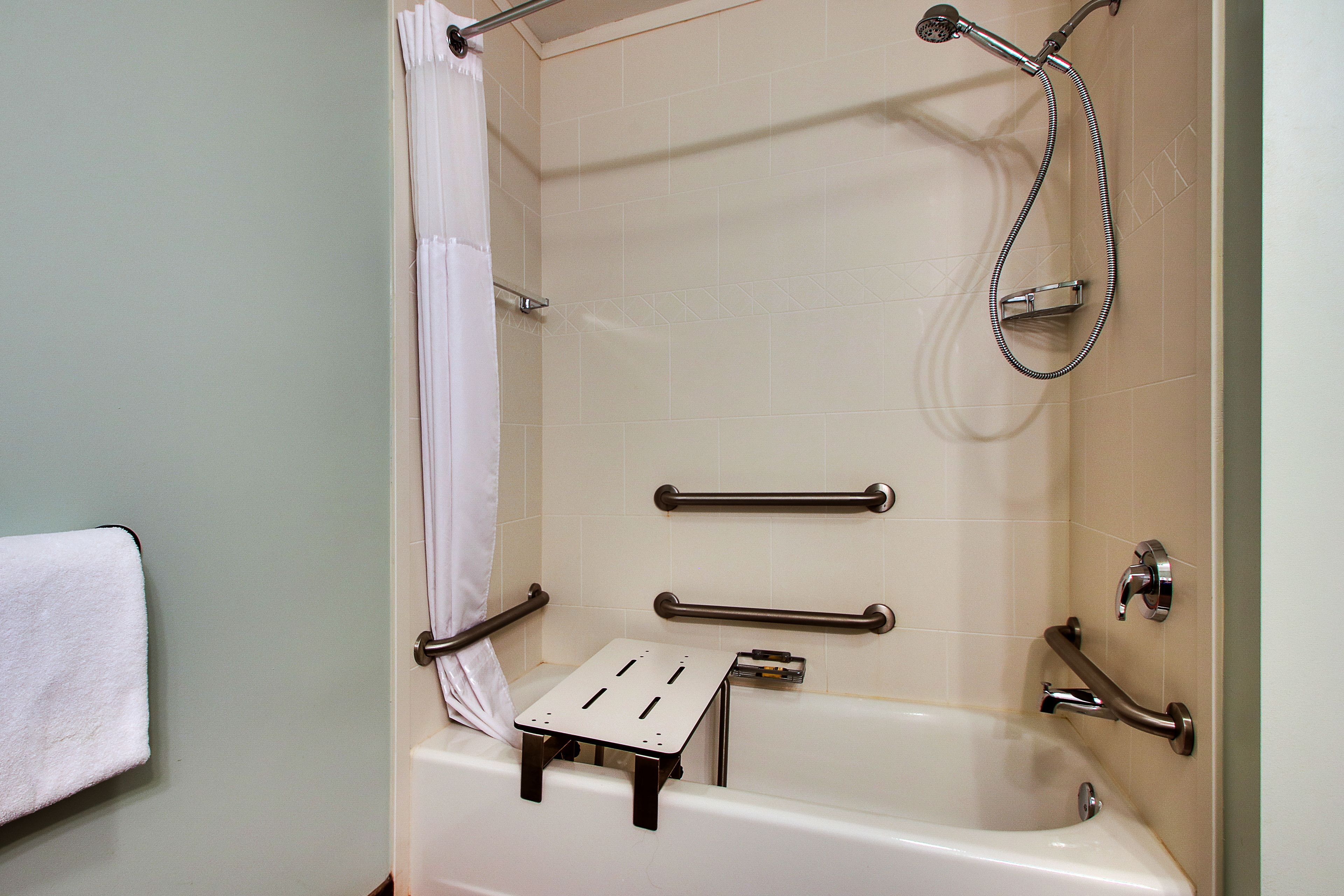 designer toiletries, hair dryer, towels