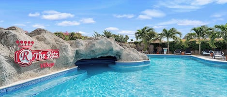 2 outdoor pools, open 7:00 AM to 10 PM, pool umbrellas, pool loungers