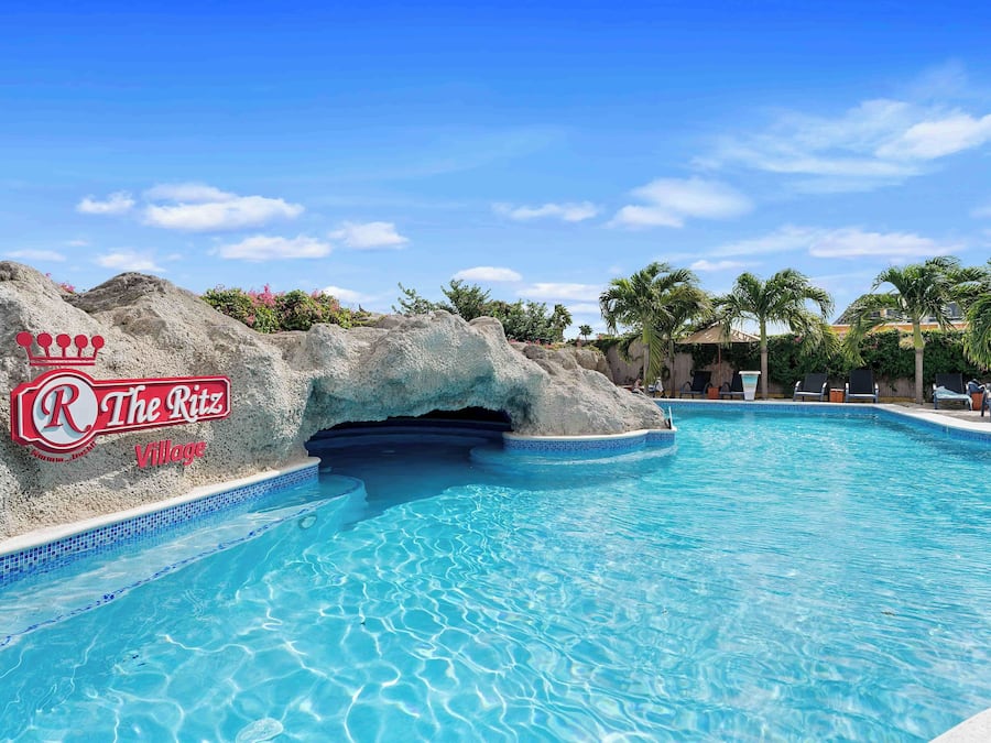 2 outdoor pools, open 7:00 AM to 10 PM, pool umbrellas, pool loungers