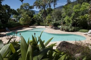 Outdoor pool, pool umbrellas, pool loungers