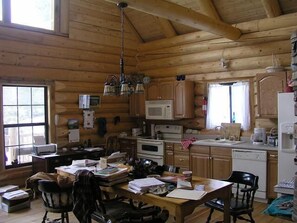 Deluxe Cabin, Multiple Bedrooms, 2 Bathrooms | Private kitchen | Fridge, microwave, coffee/tea maker, cookware/dishes/utensils