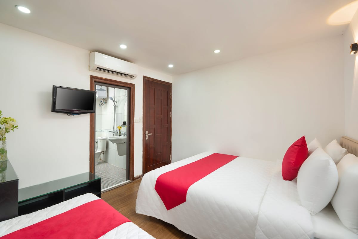 Superior Triple Room | Minibar, in-room safe, desk, soundproofing