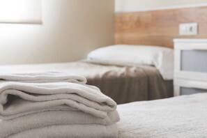 1 bedroom, blackout drapes, soundproofing, iron/ironing board