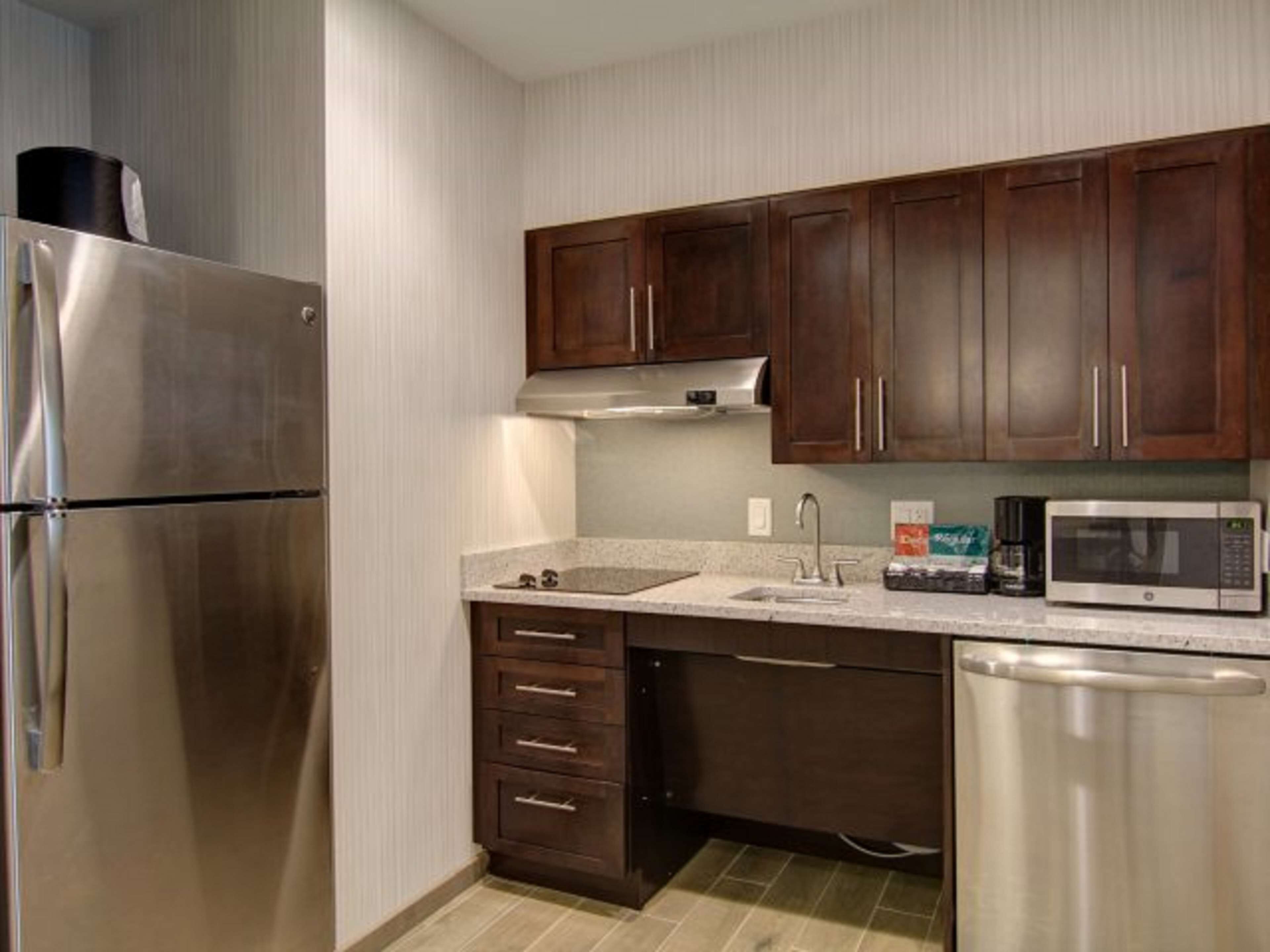 suite, 2 queen beds, accessible, bathtub | private kitchen | fridge, microwave, stovetop, dishwasher