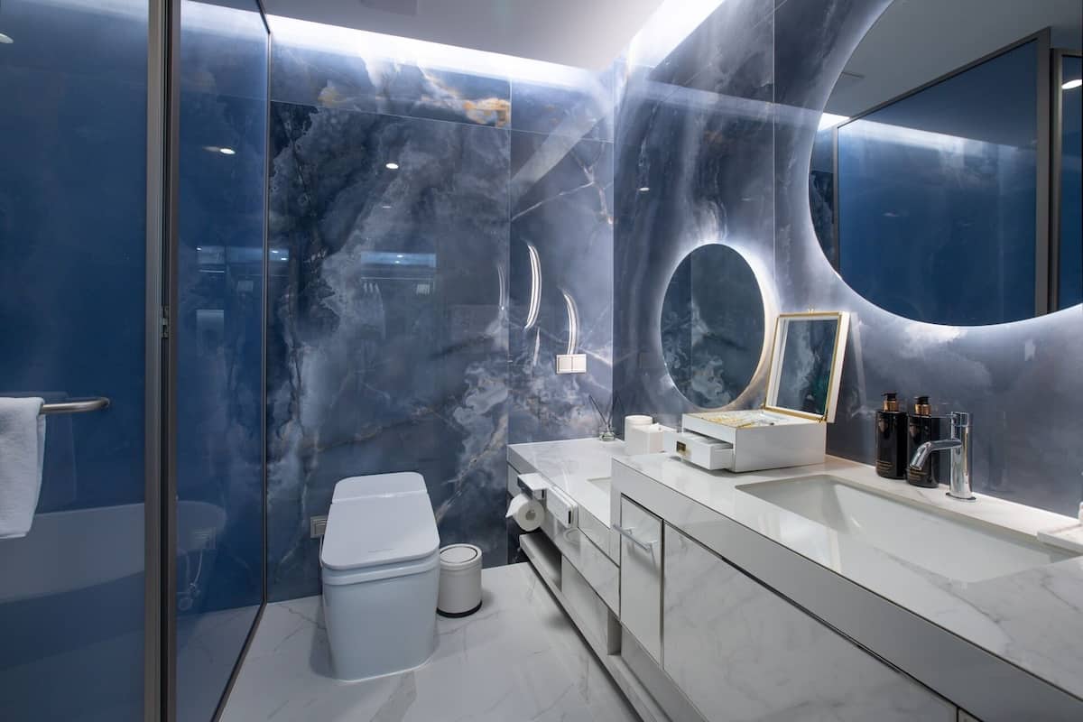 separate bathtub and shower, designer toiletries, hair dryer, bathrobes