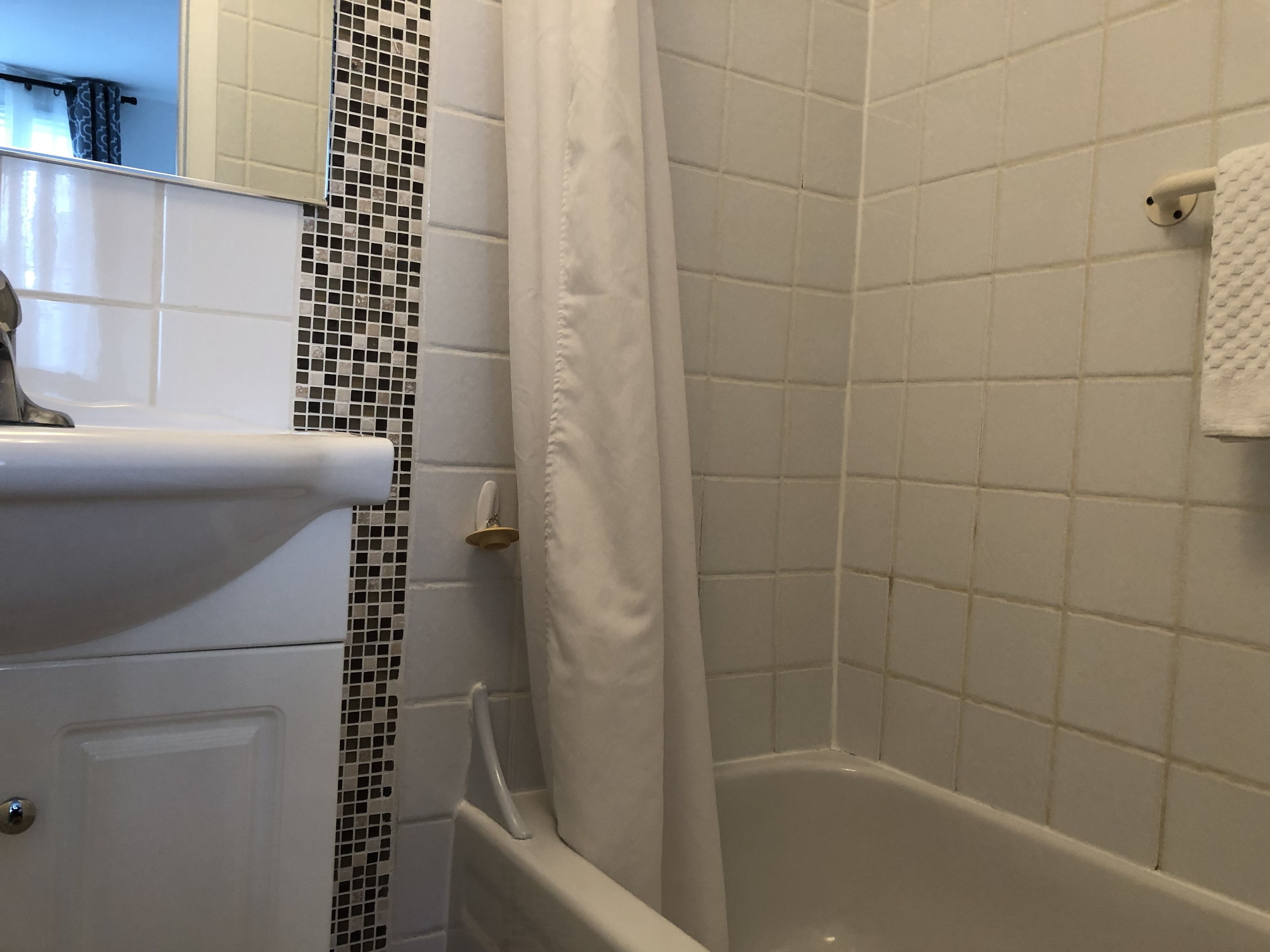 classic room, 2 double beds | bathroom | combined shower/bathtub, hair dryer, towels