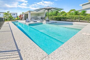 Outdoor pool, pool umbrellas, sun loungers