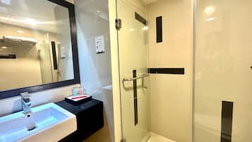 Shower, free toiletries, hair dryer, slippers