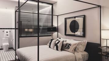 Un dormitorio moderno con cama con dosel, un ventanal con persianas, una mesita de noche con lámpara y un espejo instalado en la pared.