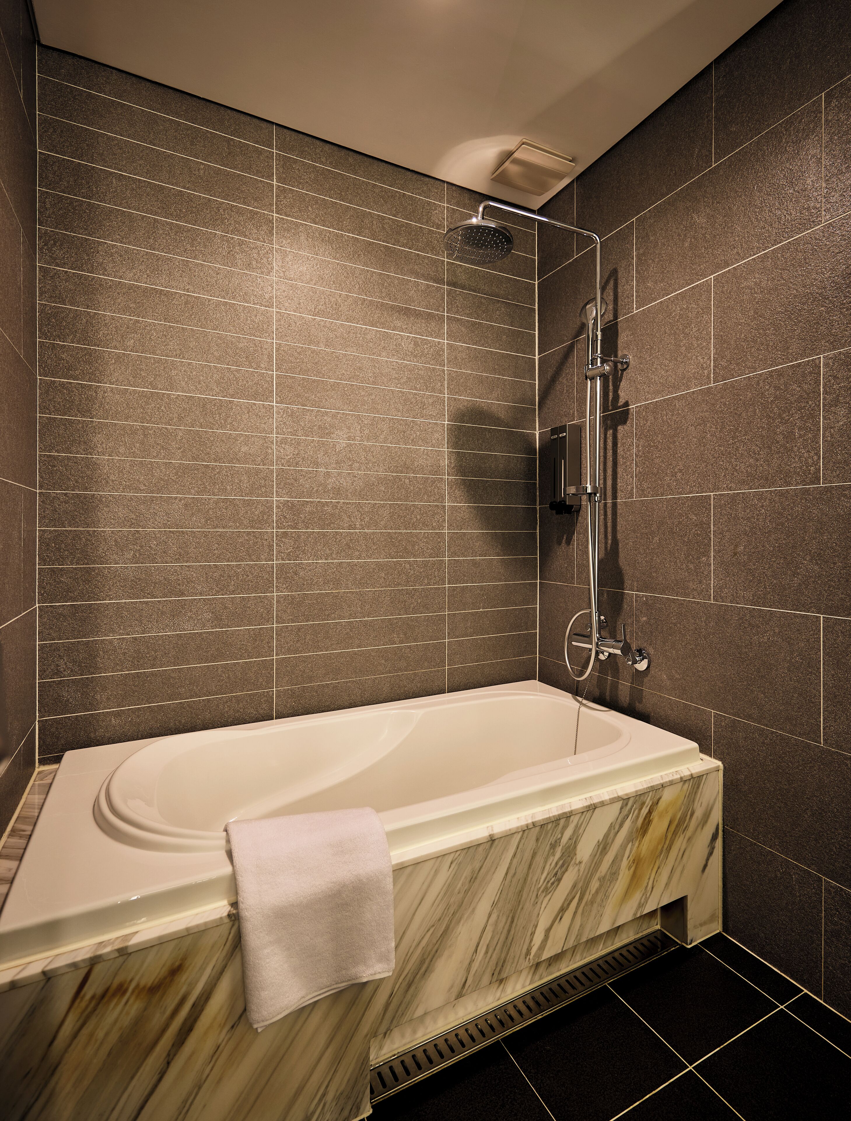 mayplace suite | bathroom | deep-soaking bathtub, free toiletries, hair dryer, dressing gowns