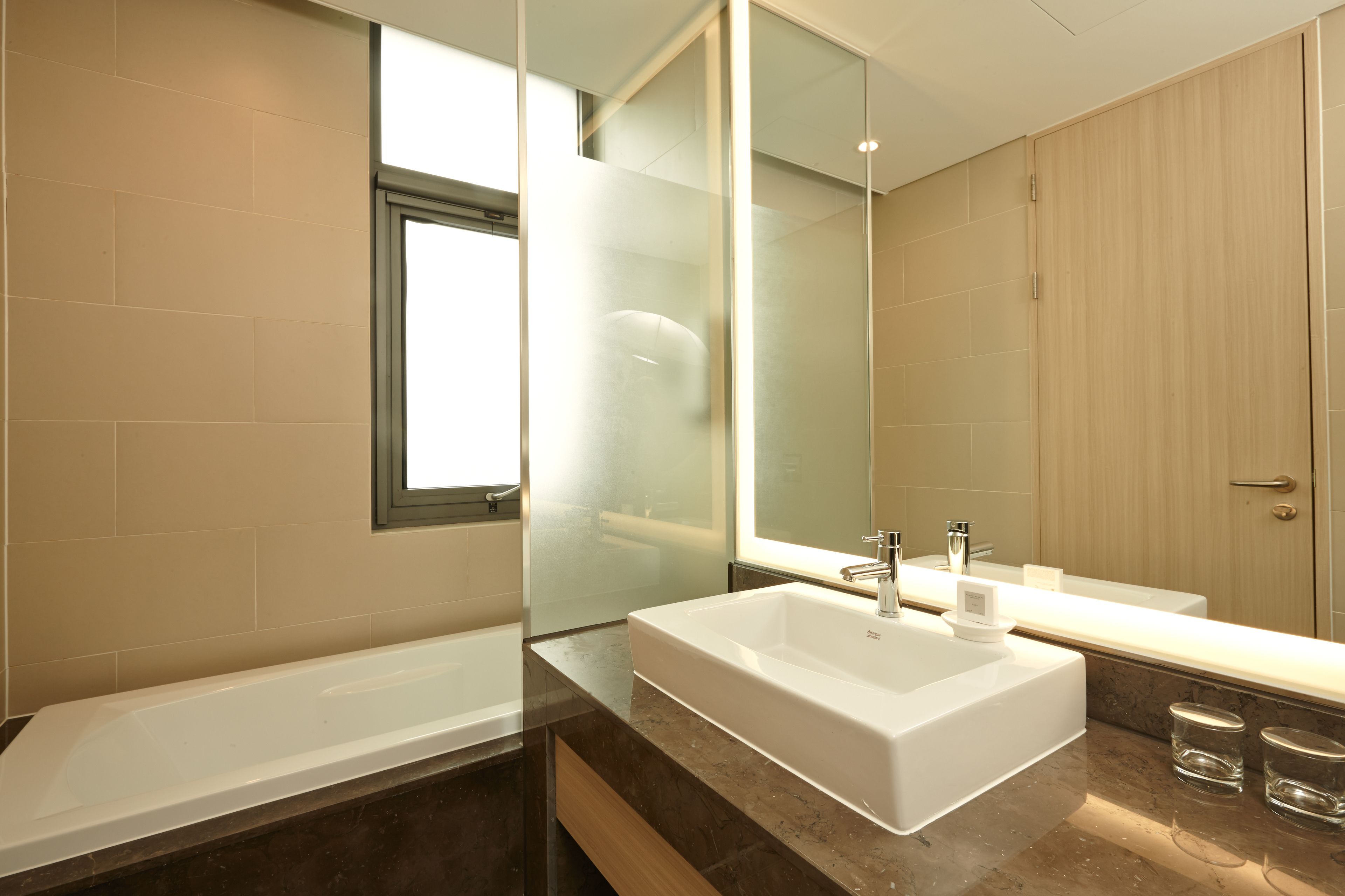 deluxe twin room | bathroom | deep-soaking bathtub, free toiletries, hair dryer, dressing gowns