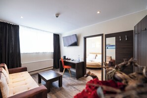 Junior Suite, 1 Bedroom, Bathtub, Courtyard Area | Living area | 32-inch flat-screen TV with satellite channels, TV