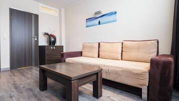 Junior Suite, 1 Bedroom, Bathtub, Courtyard Area | Living area | 32-inch flat-screen TV with satellite channels, TV