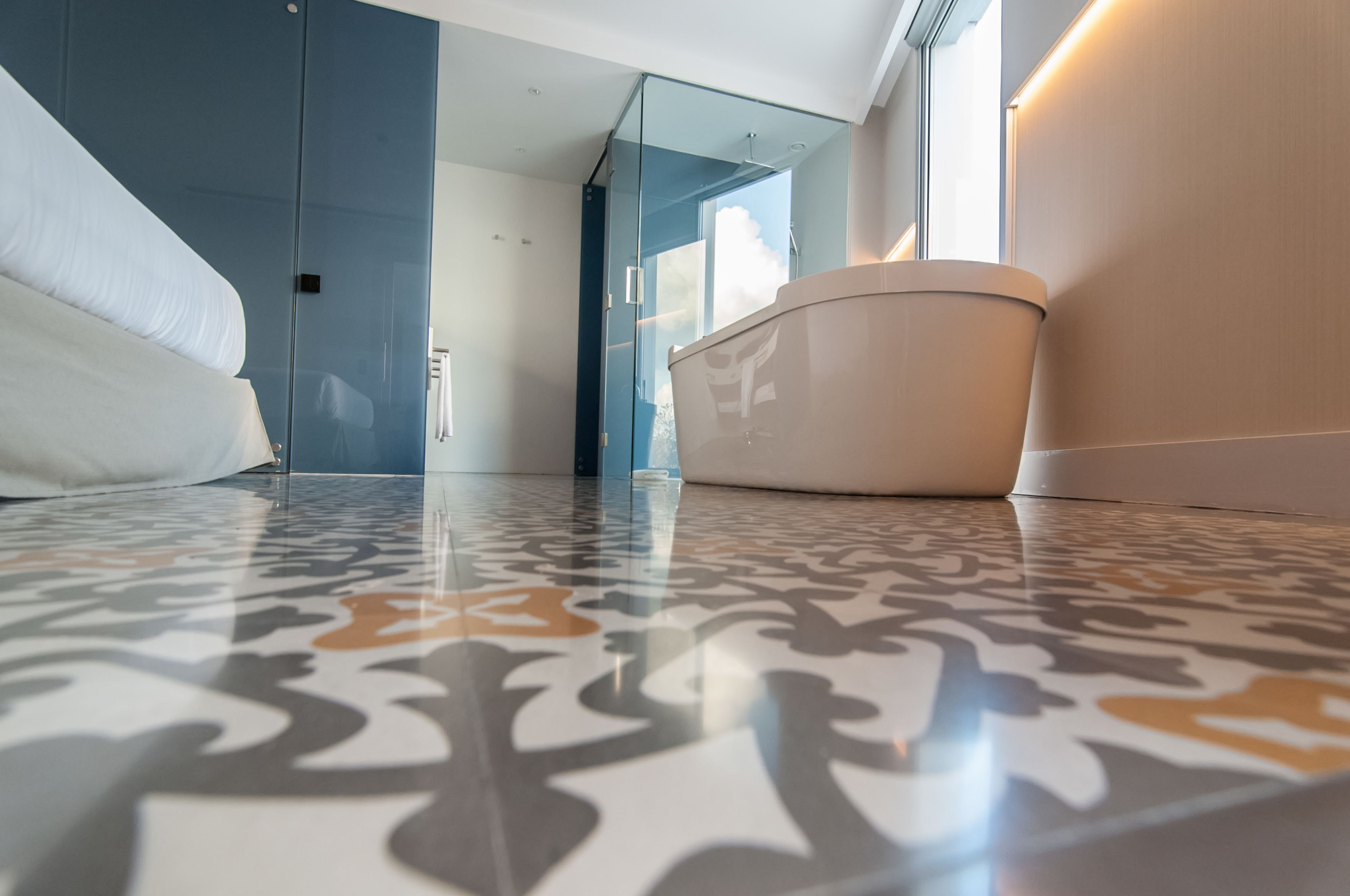 junior suite | bathroom | shower, rainfall showerhead, designer toiletries, hair dryer