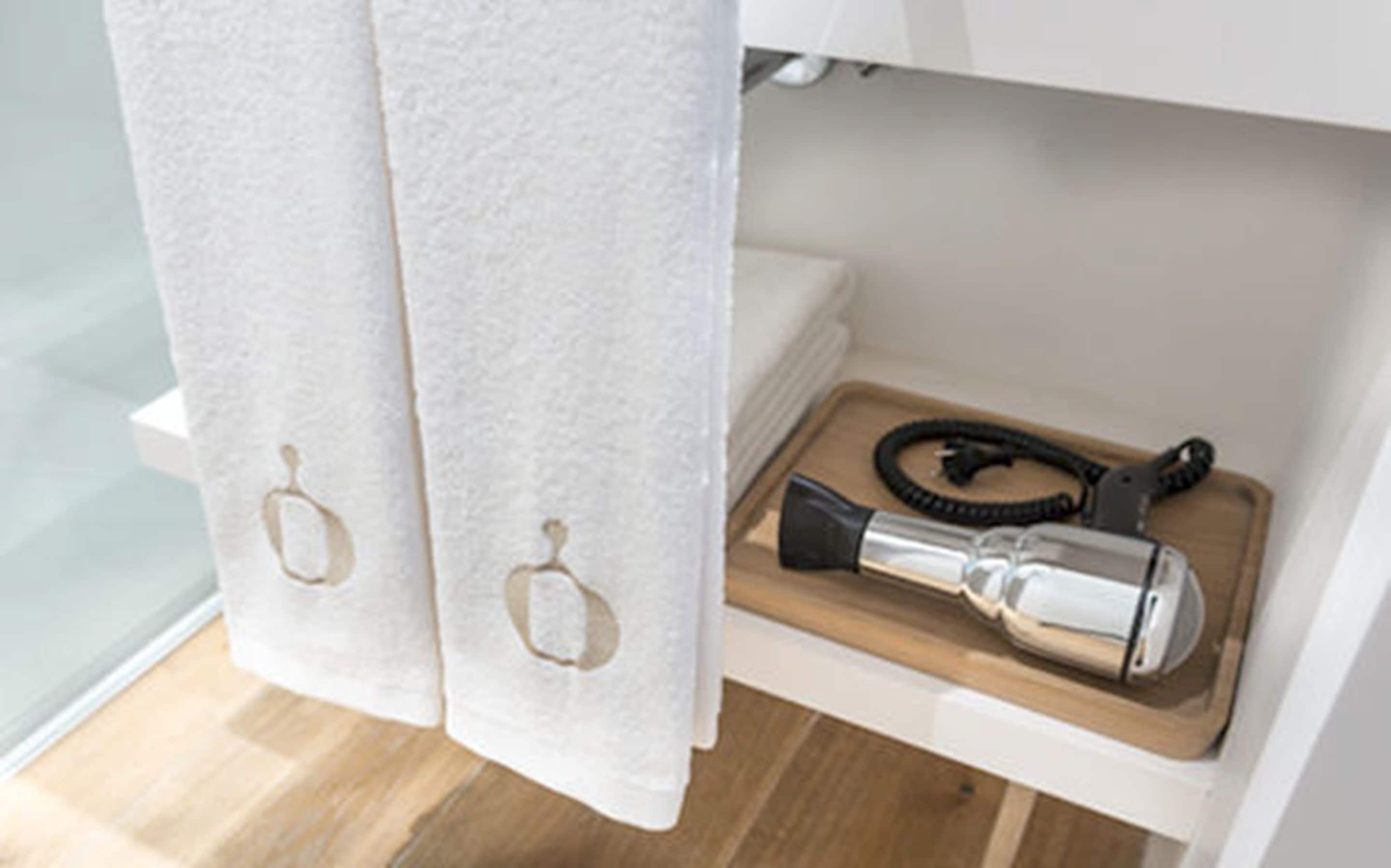 shower, rainfall showerhead, designer toiletries, hair dryer