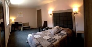Desk, soundproofing, free cots/infant beds, rollaway beds
