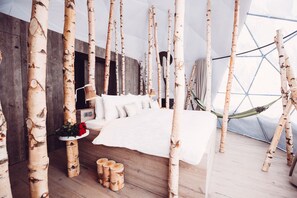 Premium bedding, in-room safe, laptop workspace, soundproofing