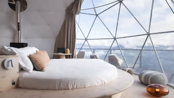 Premium bedding, in-room safe, laptop workspace, soundproofing