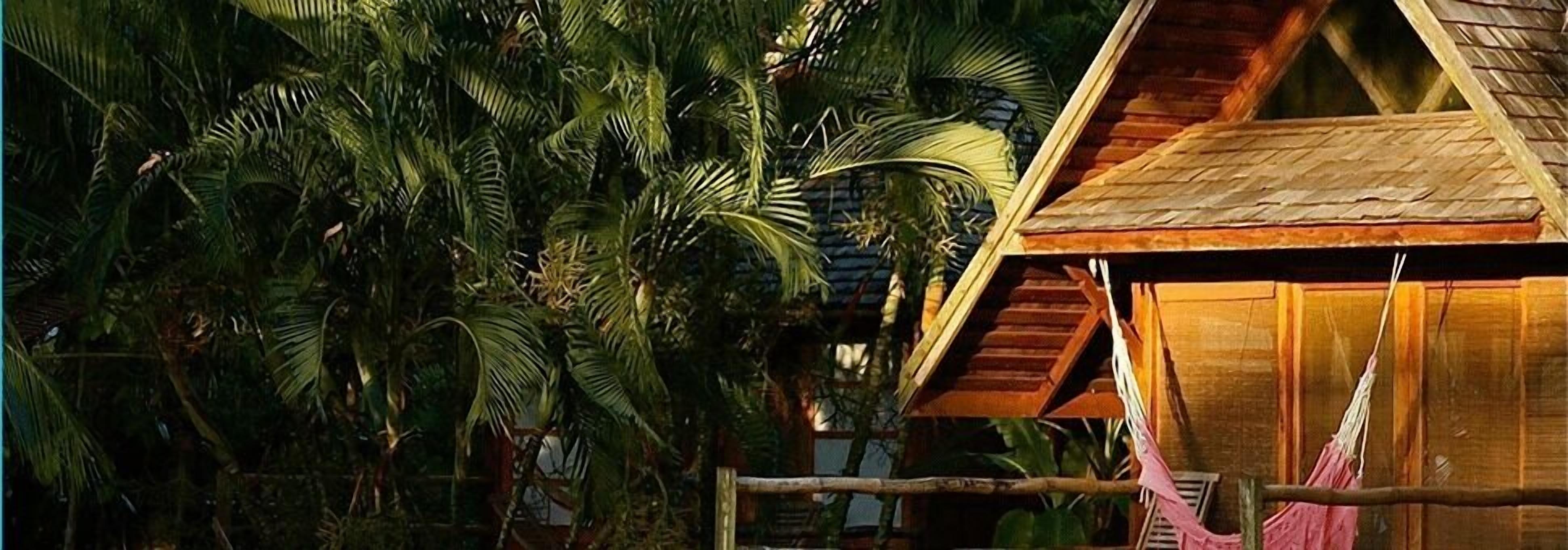 standard cottage, 1 king bed, balcony, ocean view | in-room safe, individually decorated, individually furnished